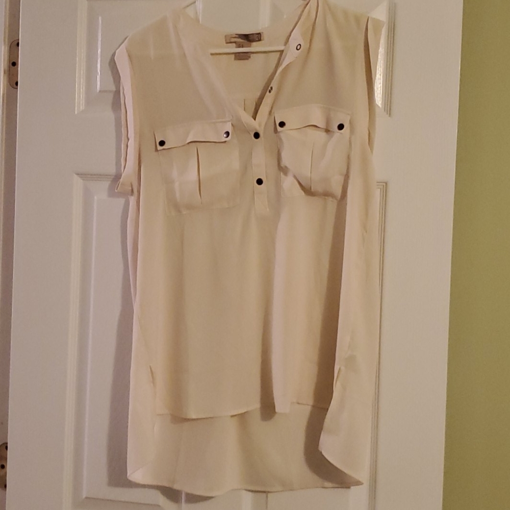 Cream sleeveless high low blouse